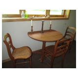 36in round Wood drop leaf table, 3-...