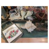 Carved wood and porcelain figurines...