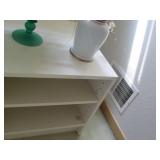 Small white 2-tier bookshelf and va...