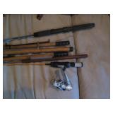 Handful of vintage ice fishing rods...