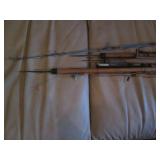 Handful of vintage ice fishing rods...