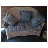 Wicker love seat and side table...