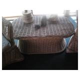 2 Wicker chairs and a matching tabl...