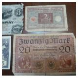 Variety of paper money and insurance certificate