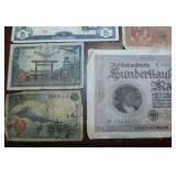 Variety of paper money and insurance certificate