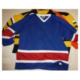 Five size 2XL hockey jerseys various colors