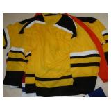 Five size 2XL hockey jerseys various colors