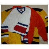 Five size 2XL hockey jerseys various colors