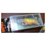 Fishing lot - 3 new rapala Shad, new John Deere spoon lure, New leader sleeves, bait, and rod finish