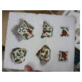 Two porcelain mini tea sets