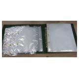 folder with about 30 8-1/2x11 photo pages and 12 ziplock pages for crafts or fishing stuff