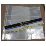 folder with about 30 8-1/2x11 photo pages and 12 ziplock pages for crafts or fishing stuff