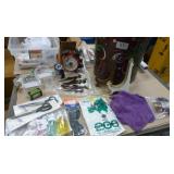 Can full of whatever fits - clock, scissors, stamps, watch, microfiber cloth, plate stands, vacuum bags