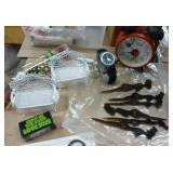 Can full of whatever fits - clock, scissors, stamps, watch, microfiber cloth, plate stands, vacuum bags