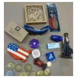 Can full of whatever fits - clock, scissors, stamps, watch, microfiber cloth, plate stands, vacuum bags