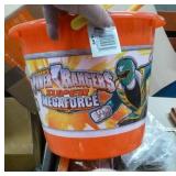 Sand pail full of beanie babies and dinosaur temporary tatoos