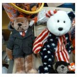 Sand pail full of beanie babies and dinosaur temporary tatoos