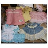 Group of doll clothes