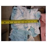 Group of doll clothes