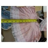 Group of doll clothes