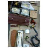5 belt buckles, truckers wallet with chain, knife sheath, lighter, grain belt opener