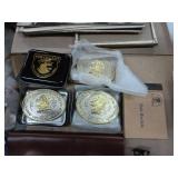 5 belt buckles, truckers wallet with chain, knife sheath, lighter, grain belt opener