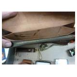 5 belt buckles, truckers wallet with chain, knife sheath, lighter, grain belt opener