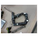 5 belt buckles, truckers wallet with chain, knife sheath, lighter, grain belt opener