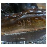 Black americana pottery figure with chicken