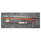 yard stick, hillbilly putter and a piece of strut