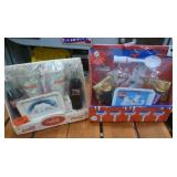 Two collectible sets of Coke glasses and bottles, tins etc