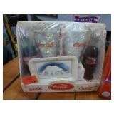 Two collectible sets of Coke glasses and bottles, tins etc