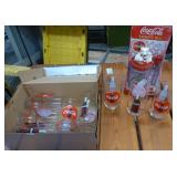 8 Coca-Cola glasses and a Talking Mug