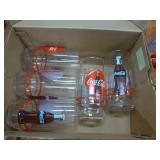 8 Coca-Cola glasses and a Talking Mug