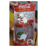 8 Coca-Cola glasses and a Talking Mug