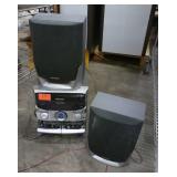 Sharp stereo with 2 cassette players, 3 CD player, radio