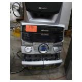 Sharp stereo with 2 cassette players, 3 CD player, radio
