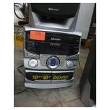 Sharp stereo with 2 cassette players, 3 CD player, radio