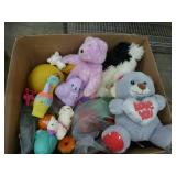Large box full of balls, toys, stuffed animals