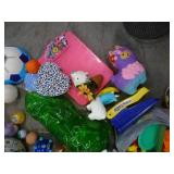Large box full of balls, toys, stuffed animals