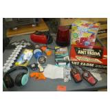 Ant Farm, 3D glasses, headphones, flashing light, Midland walkie talkies, glow in the dark slime and more