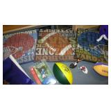 Football lot - Vikings car flags, Vikings billfolds, footballs, book on NFL, wall hangings, talking ball