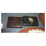 Football lot - Vikings car flags, Vikings billfolds, footballs, book on NFL, wall hangings, talking ball