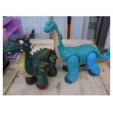 Two dinosaurs - dark green is battery operated