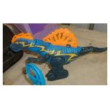 Two battery operated toys, walking/talking Trex dinosaur and squid