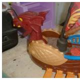 Large Dragon ship and small dragon ship both by Mattel
