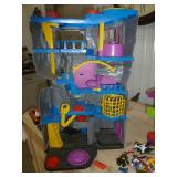 Large Batman Cave (2 ft tall)  and Jokers place Fisher Price 2010