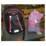 Two backpacks with sleeping bags inside - Hello Kitty and Lightning McQueen