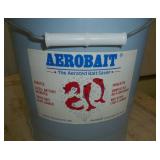 Two ice fishing tip ups and Aerobait bucket