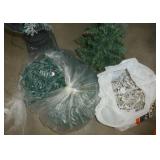 Two 4-foot christmas trees and 2 bags full of lights, the one bag must have 3 or 4 sets of lights